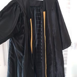 black and gold graduation gown